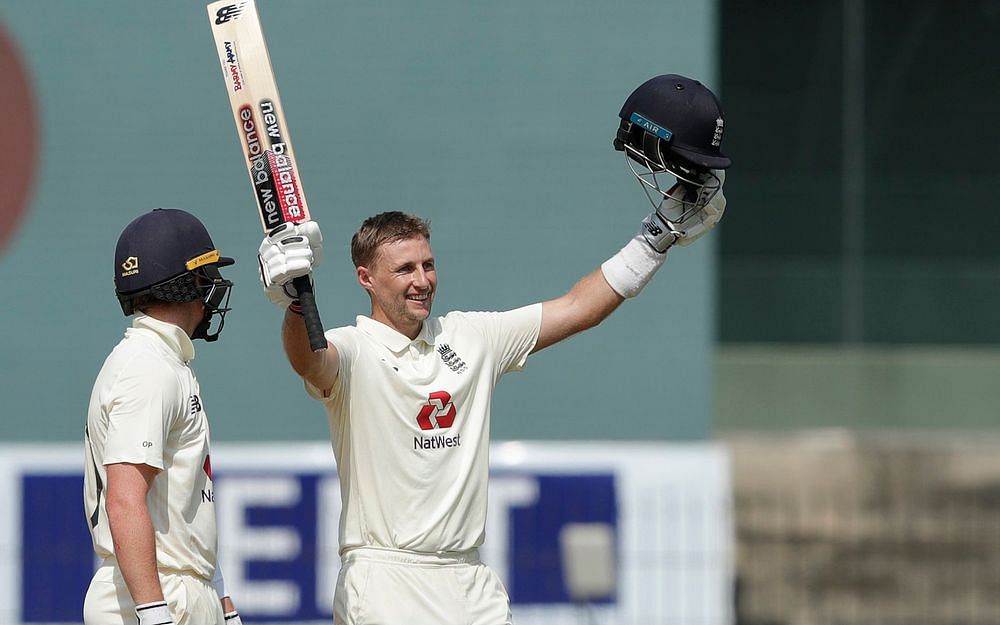 England's Joe Root celebrates after completing his double century on the second day of the first Test against India at the MA Chidambaram Stadium. BCCI 