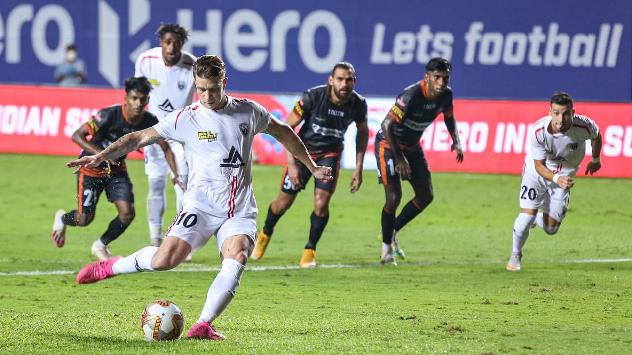 Federico Gallego Revetria of NorthEast United FC kick the ball for goal during the Indian Super League match between NorthEast United FC and FC Goa, at the Tilak Maidan Stadium. Credit: PTI.