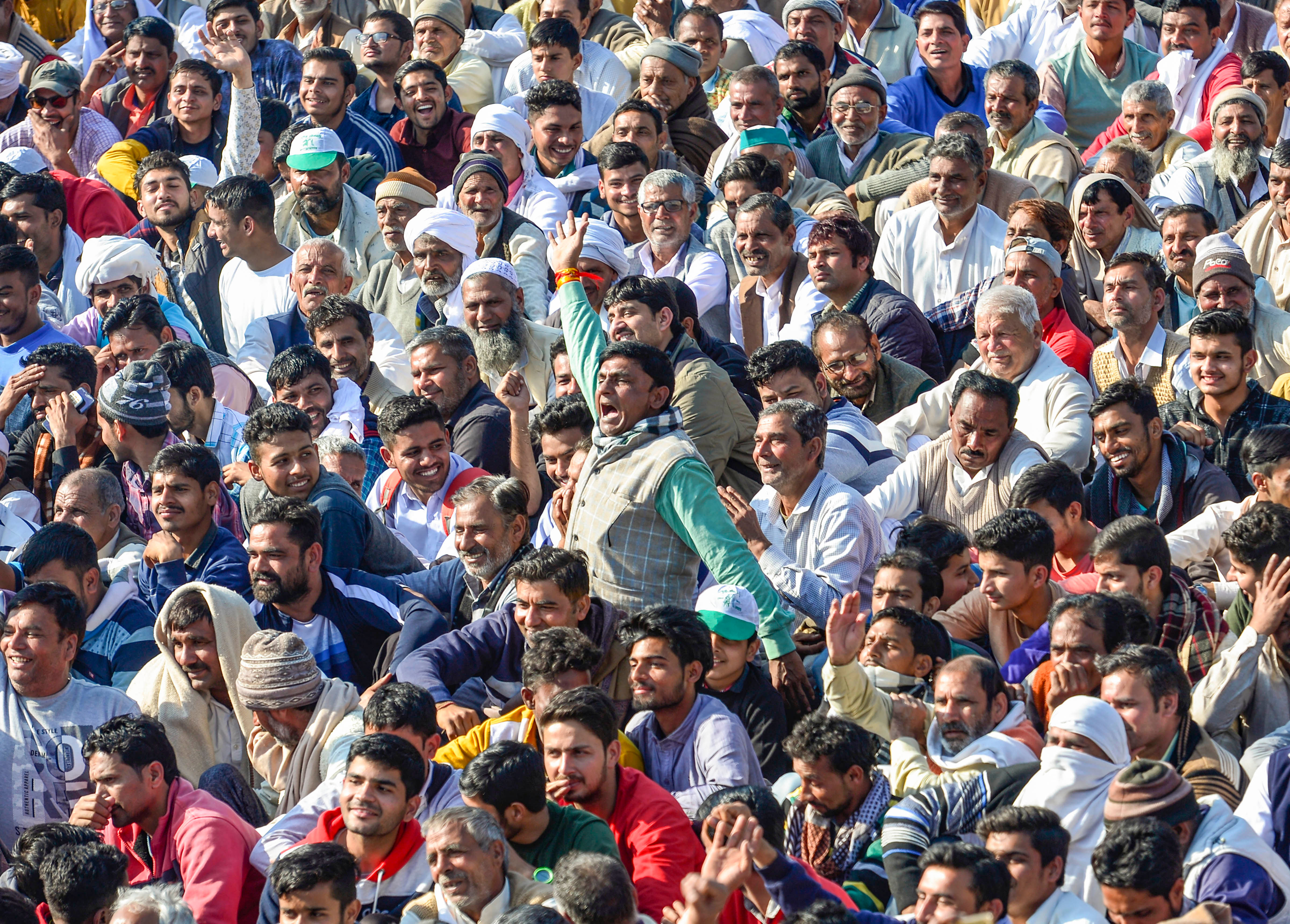 Farmers raise slogans during the 'Kisan Mahapanchayat', in Shamli district of Uttar Pradesh, Friday, Feb. 5, 2021. Credit: PTI Photo