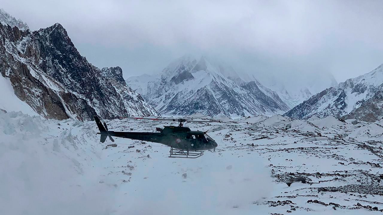 This handout photo taken on January 16, 2021 and released by Seven Summit Treks, shows a Pakistani army helicopter flying over the base camp of Mt K2, which is the second highest mountain in the world, in the Gilgit-Baltistan region of northern Pakistan. Representative Image. Credit: AFP Photo