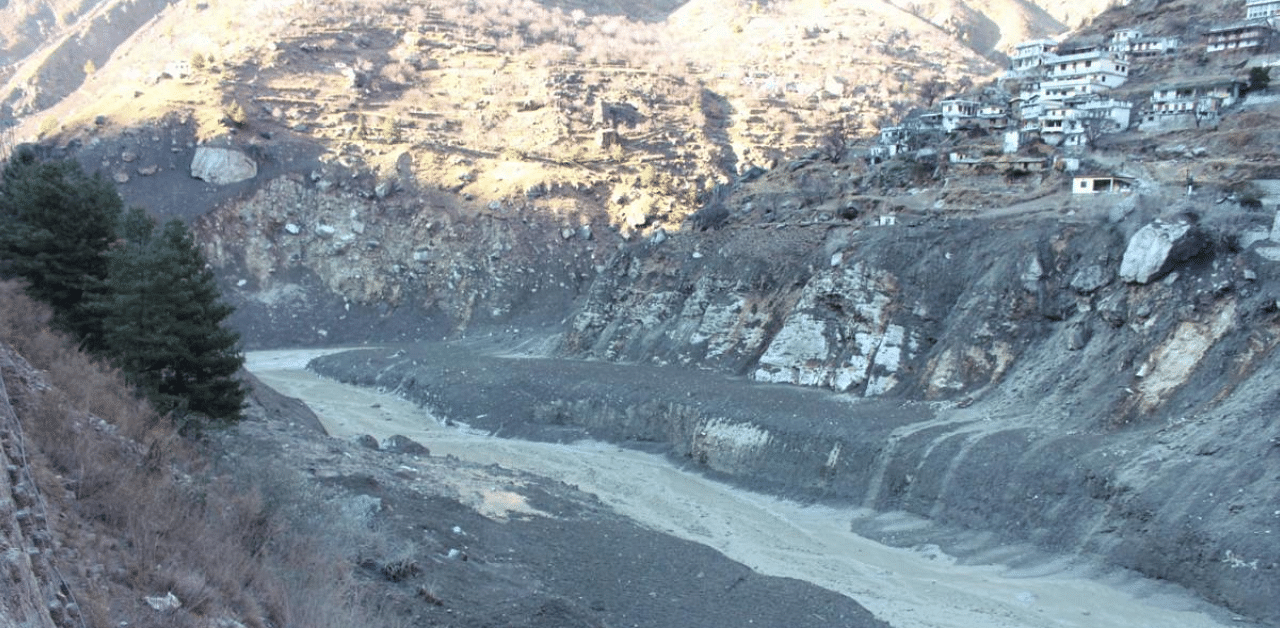  Flash flood after a glacier broke off in Joshimath causing a massive flood in the Dhauli Ganga river, in Chamoli district of Uttarakhand. Credit: PTI Photo