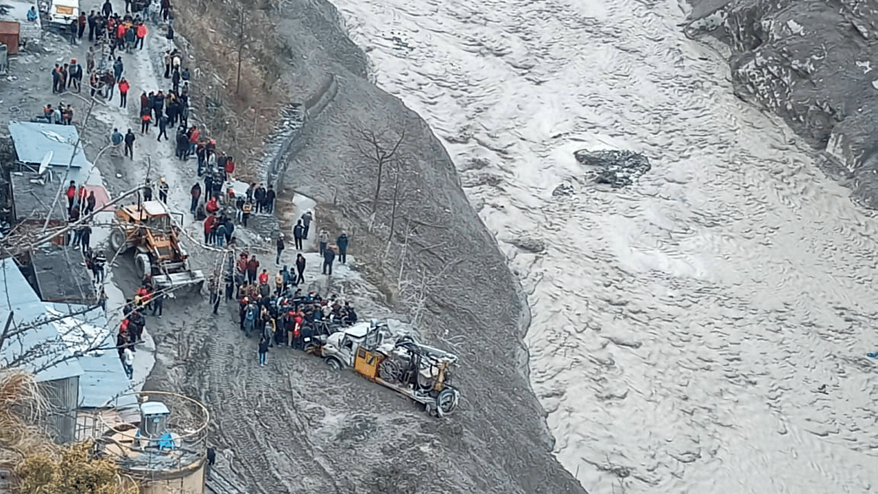 Rescue operations underway near Dhauliganga hydropower project after a glacier broke off in Joshimath causing a massive flood in the Dhauli Ganga river. Credit: PTI Photo