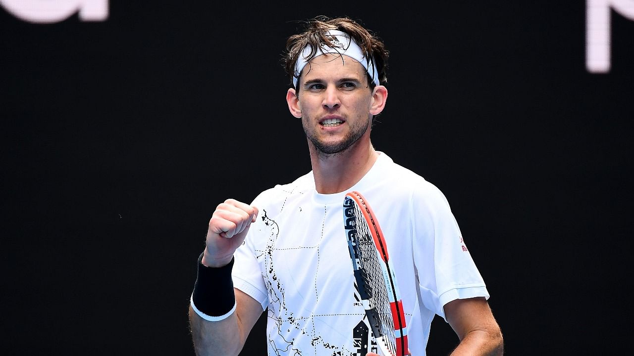 Austria's Dominic Thiem celebrates after winning against Kazakhstan's Mikhail Kukushkin during their men's singles match on day one of the Australian Open tennis tournament in Melbourne. Credit: AFP Photo.