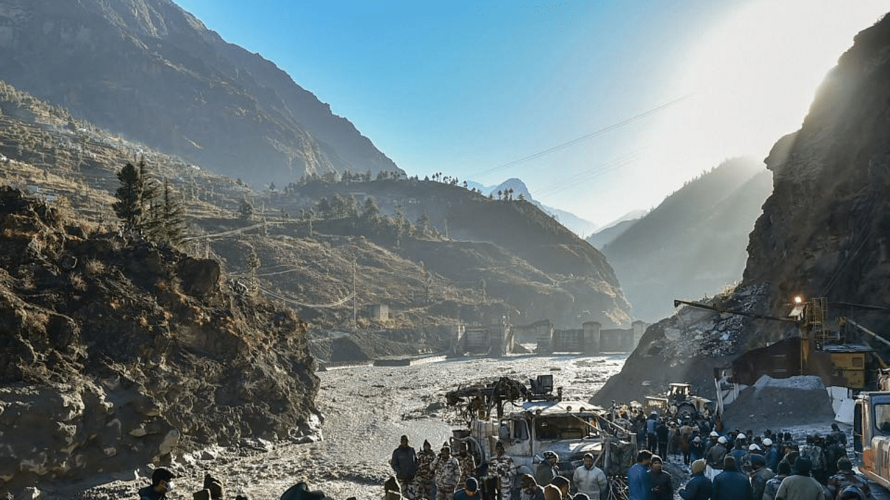 Rescue operations underway near Tapovan Tunnel, after a glacier broke off in Joshimath causing a massive flood in the Dhauli Ganga river, in Chamoli district of Uttarakhand, Monday, Feb 8, 2021. More than 150 labourers working in a power project are missing. Credit: PTI Photo