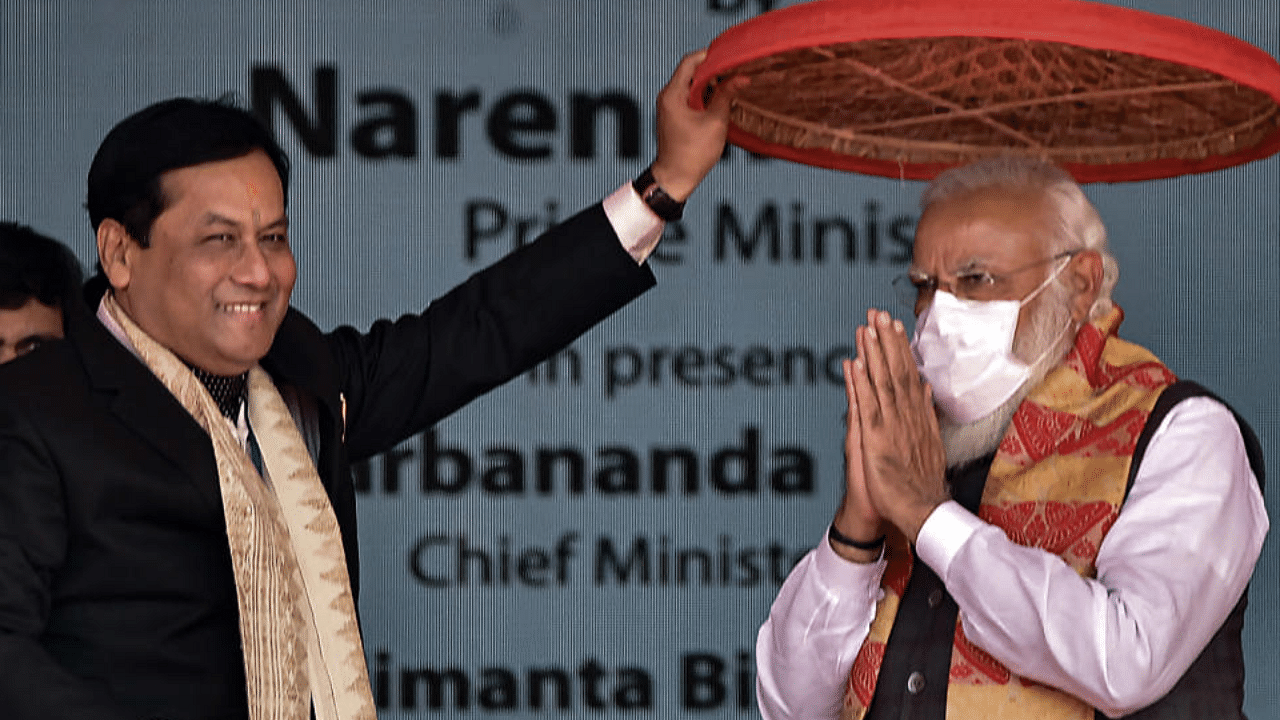 Prime Minister Narendra Modi during an event to lay foundation stone of two medical colleges and launch the scheme for the upgradation of the state highways, at Dhekiajuli in Sonitpur district, Sunday, Feb. 7, 2021. Credit: PTI Photo