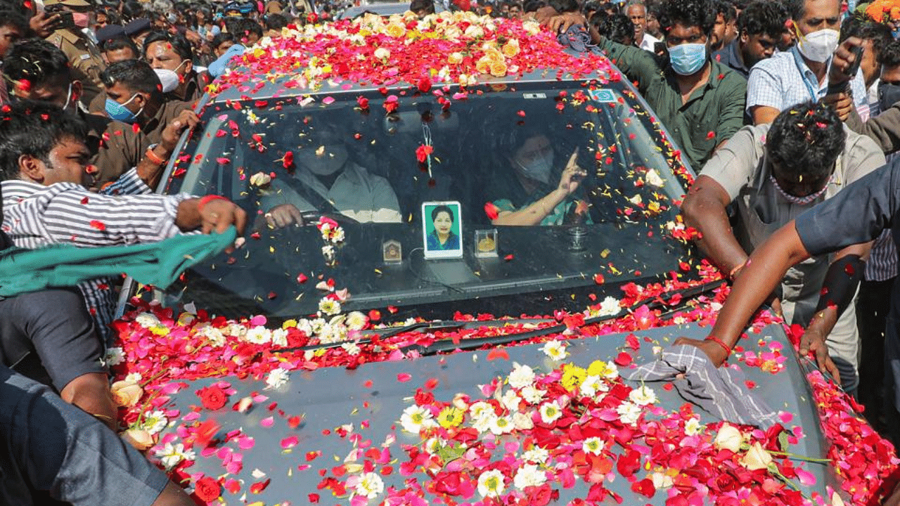 Expelled AIADMK leader VK Sasikala is welcomed by her supporters as she enters Tamil Nadu via Krishnagiri district, Monday, Feb. 8, 2021. Sasikala returned to Tamil Nadu, days after completing her four-year jail term in Bengaluru in a Rs 66.65 crore disproportionate assets case. Credit: PTI Photo