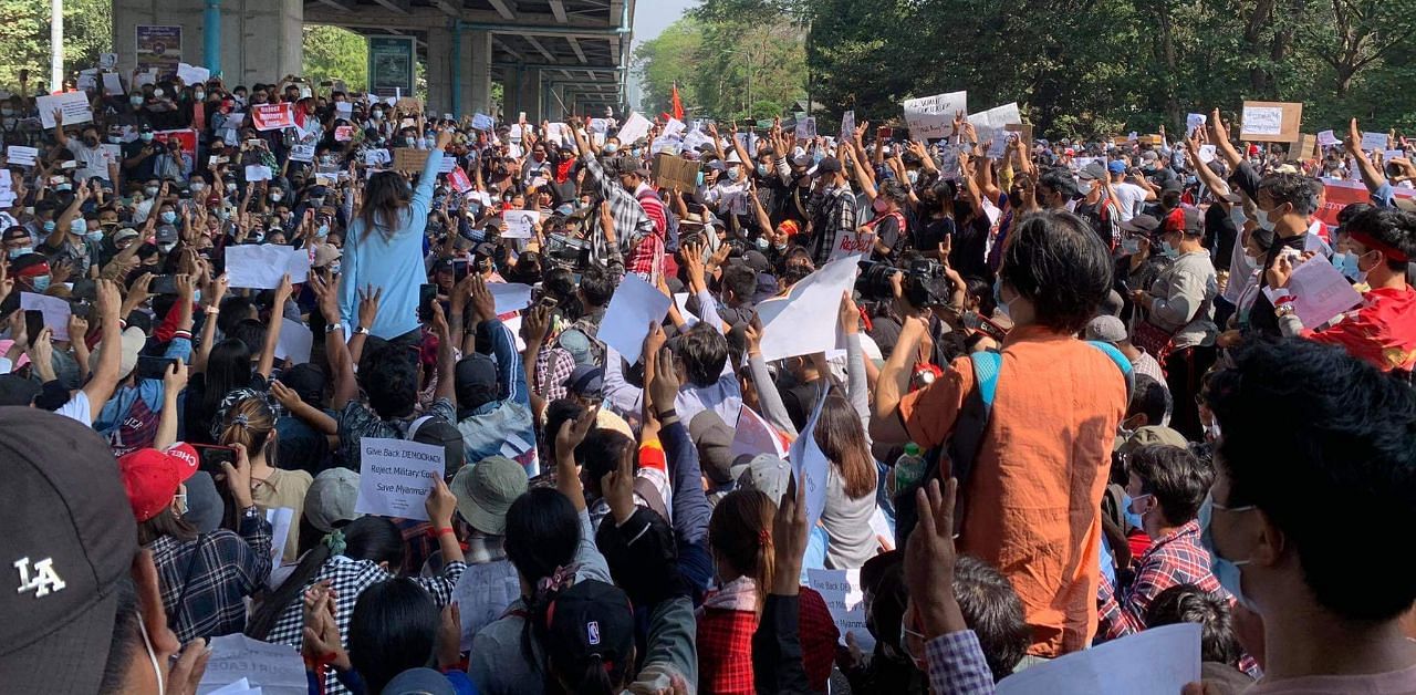 Protesters gather under a bridge in Yangon on the Monday, February 8, 2021 demanding the restoration of democracy and the release of Aung San Suu Kyi. Credit: Special arrangement. 