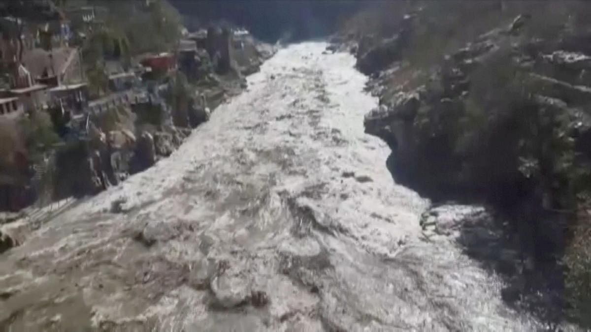 General view during a flood in Chamoli, Uttarakhand, India February 7, 2021 in this still image obtained from a video. Credit: ANI/REUTERS TV/via REUTERS