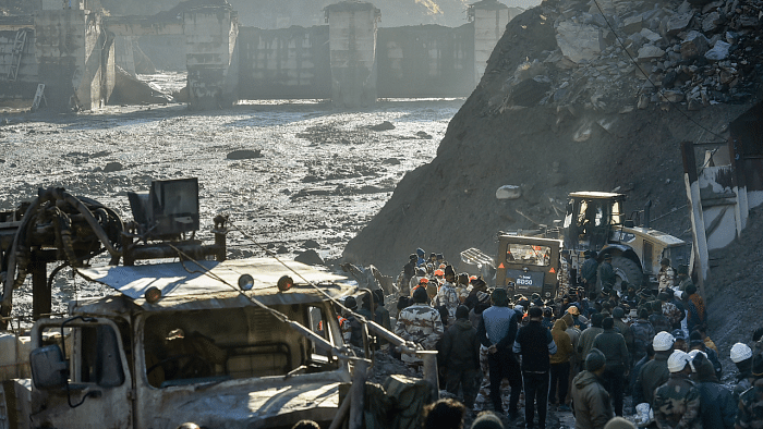 Rescue operations underway near Tapovan Tunnel, after a glacier broke off in Joshimath causing a massive flood in the Dhauli Ganga river, in Chamoli district of Uttarakhand. Credit: PTI Photo