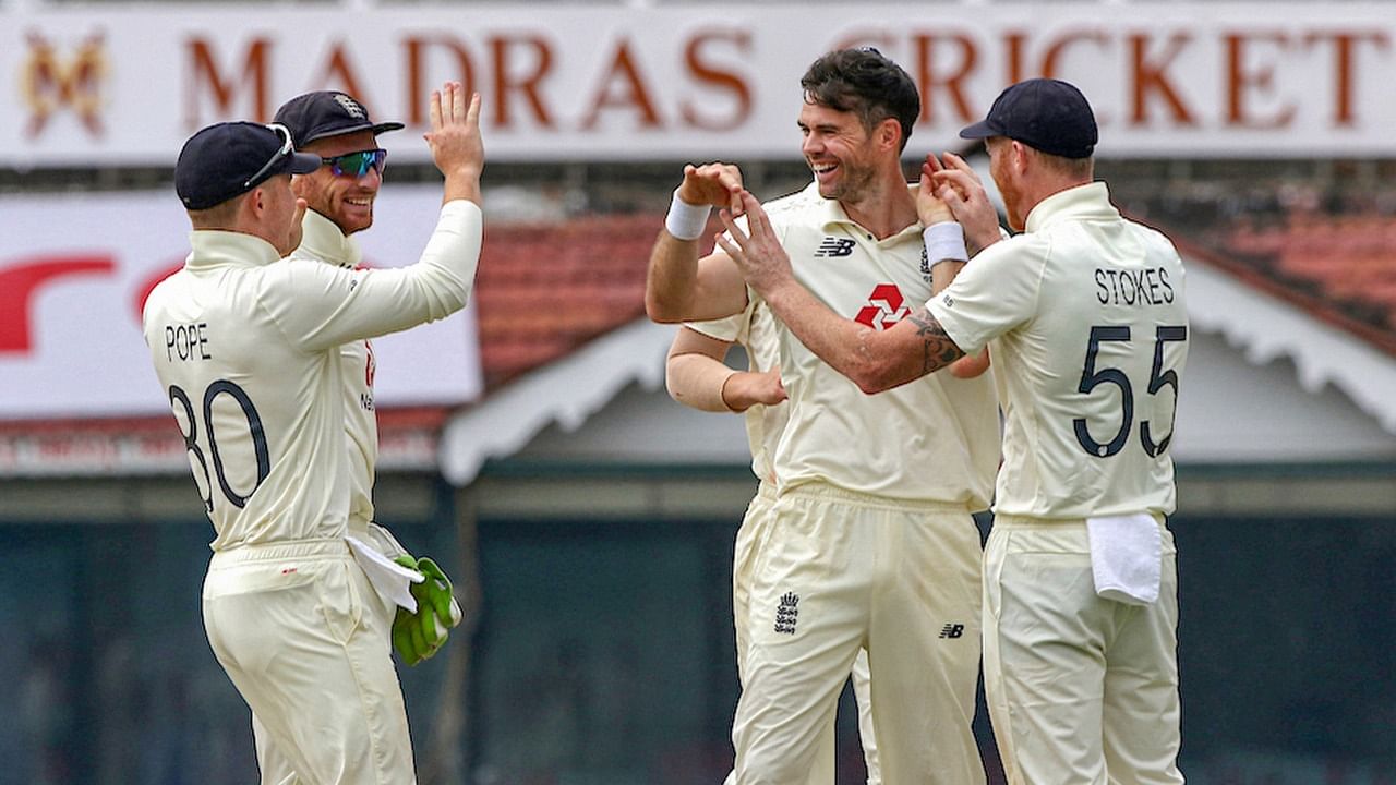 England pacer Jimmy Anderson celebrates with his teammates after dismissing Ajinkya Rahane for a duck. Credit: PTI Photo.