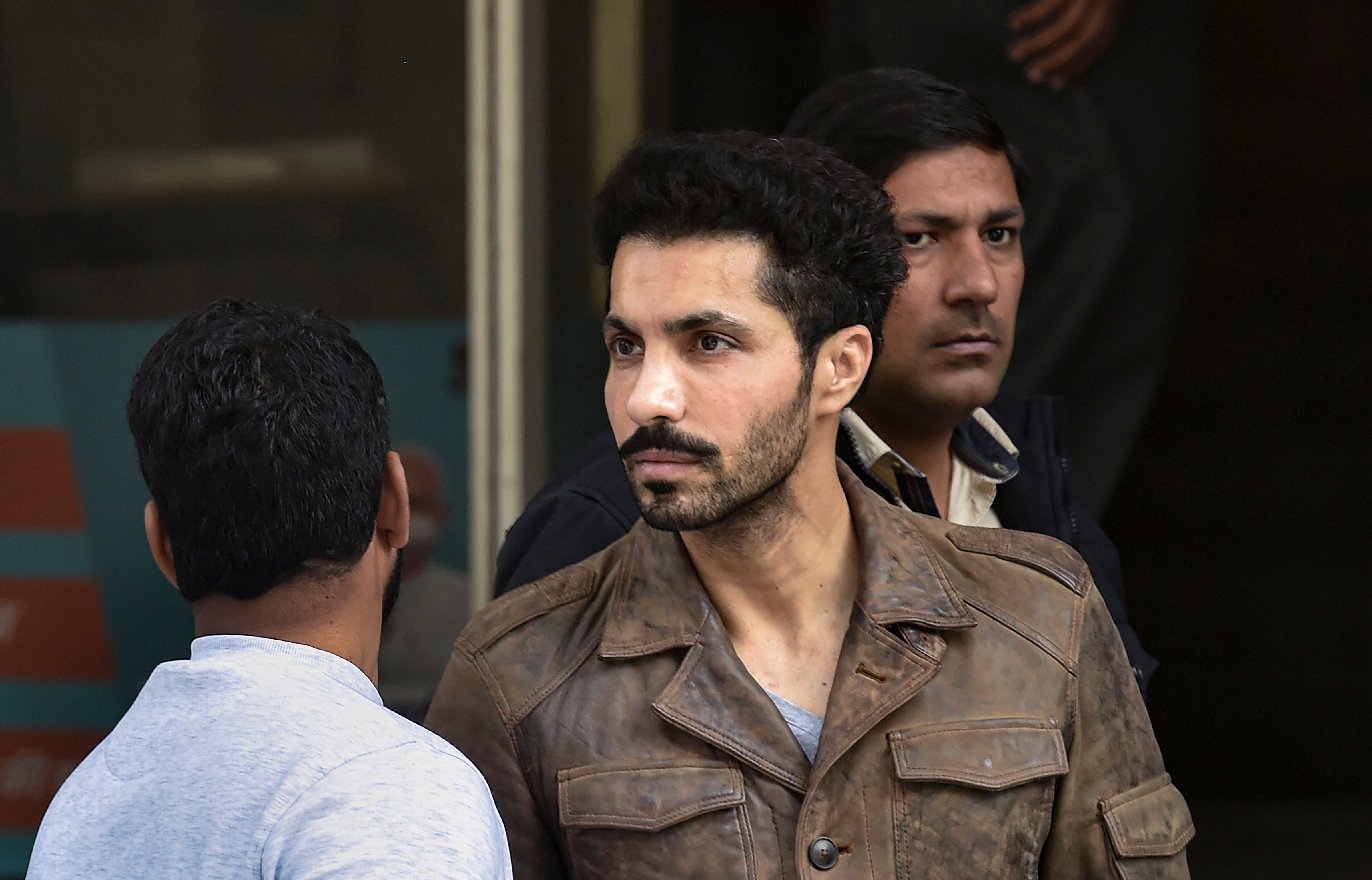 Actor Deep Sidhu, accused in the violence on Republic Day during a farmers' tractor rally, arrested by Delhi Police special cell in New Delhi, Tuesday, Feb. 9, 2021. Credit: PTI Photo