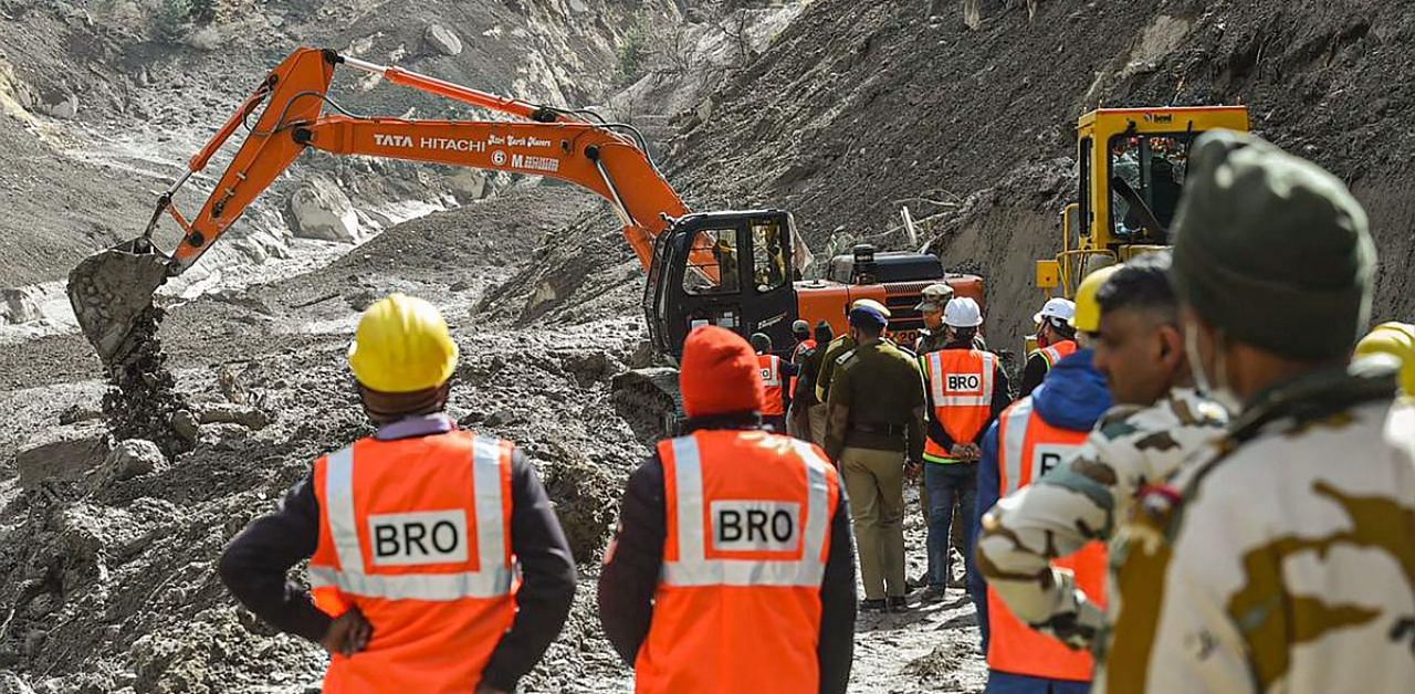 Rescue operations underway, after a glacier broke off in Joshimath causing a massive flood in the Dhauli Ganga river, in Chamoli district of Uttarakhand. Credit: PTI photo. 