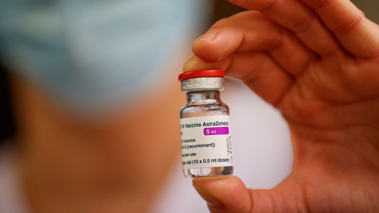 A member of the medical staff holds a vial of the AstraZeneca-Oxford Covid-19 vaccine. Credit: Reuters File Photo.