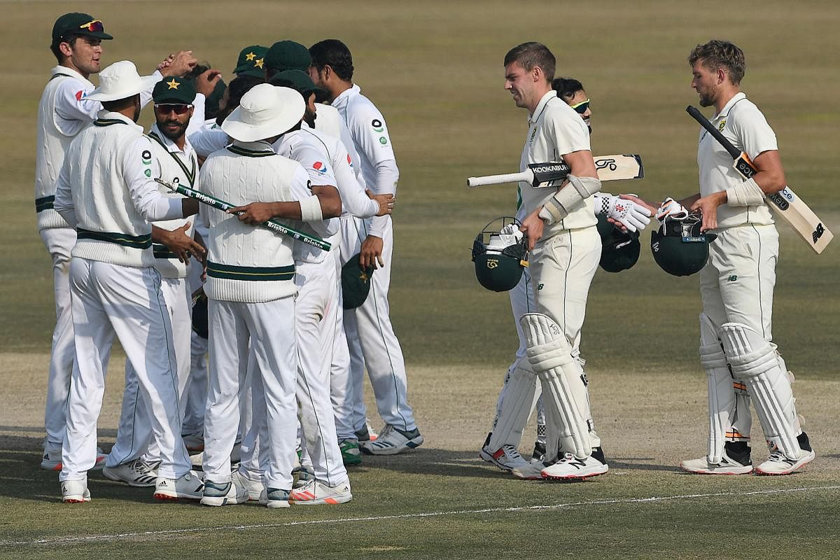 Pakistan's players celebrate after winning the Test series. Credit: AFP photo. 