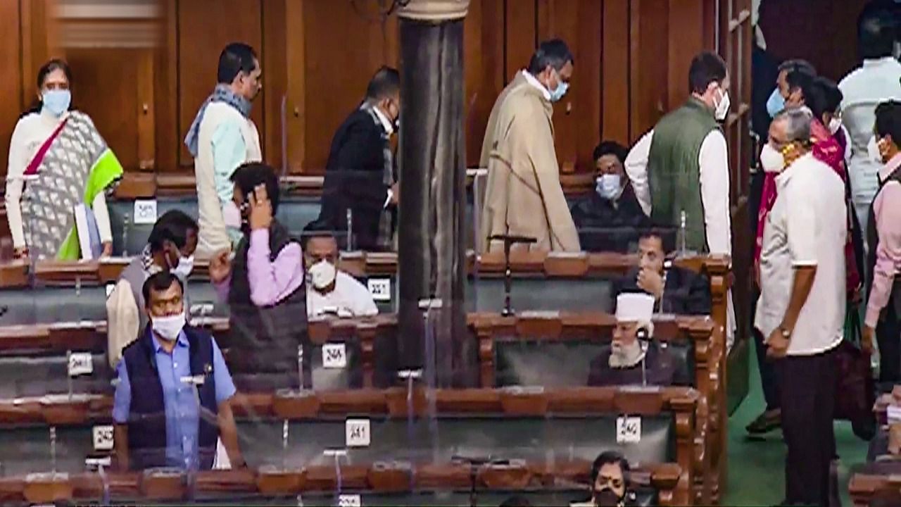  Congress members walk out of the Lok Sabha during the ongoing Budget Session of Parliament. Credit: PTI File Photo