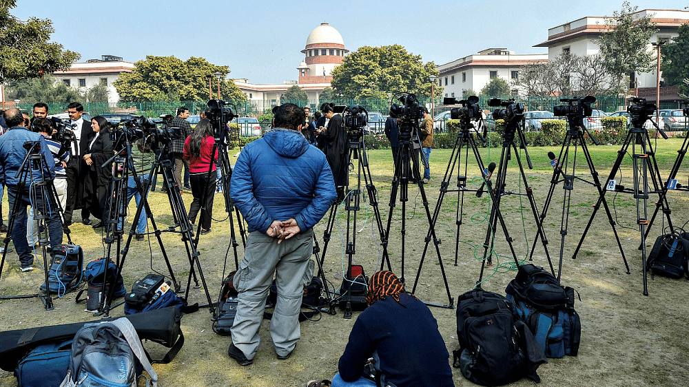 Media personnel outside the Supreme Court. Credit: PTI Photo