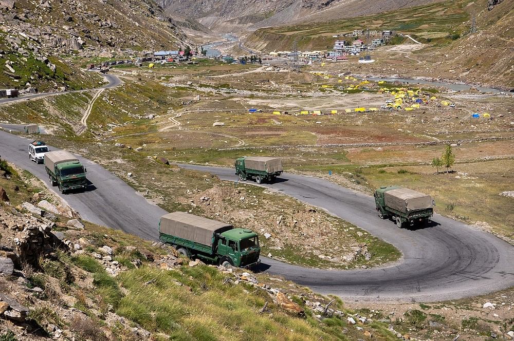An army convoy carrying military material on its way to Ladakh amid border tension with China, at Manali-Leh highway. Credit: PTI Photo