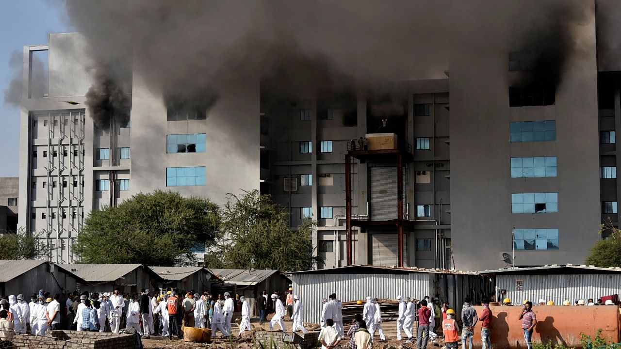 Smoke billows after a fire broke out inside the complex of the Serum Institute of India, in Pune, India. Credit: Reuters File Photo.