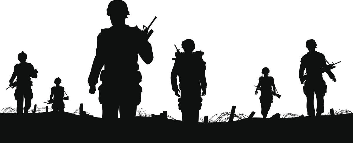 Editable vector foreground of silhouettes of walking soldiers on patrol with figures as separate elements. Credit: iStock Photo