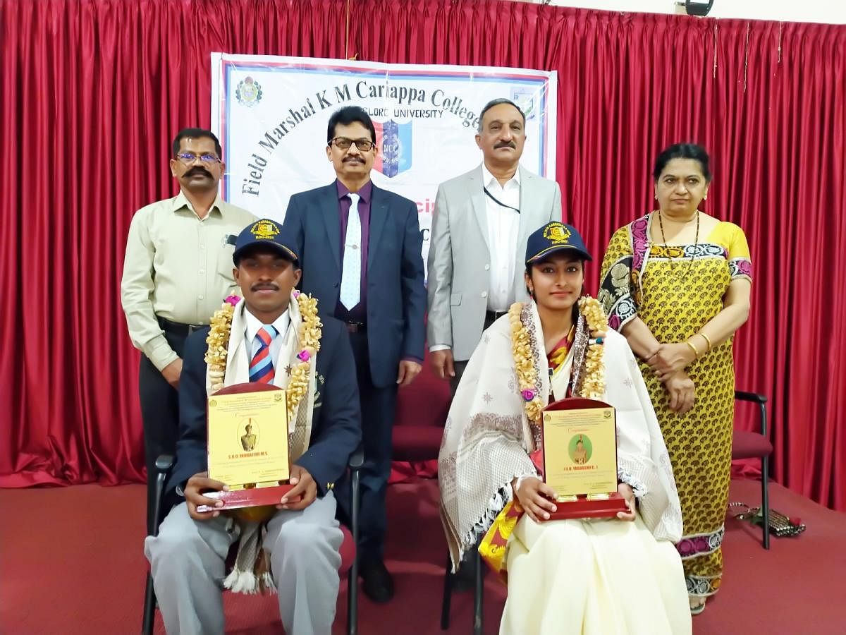 Mangalore University Vice Chancellor Prof P S Yadapadithaya felicitated NCC cadets Indrajith and Yashaswi C T who had taken part in the Republic Day parade in Delhi recently.