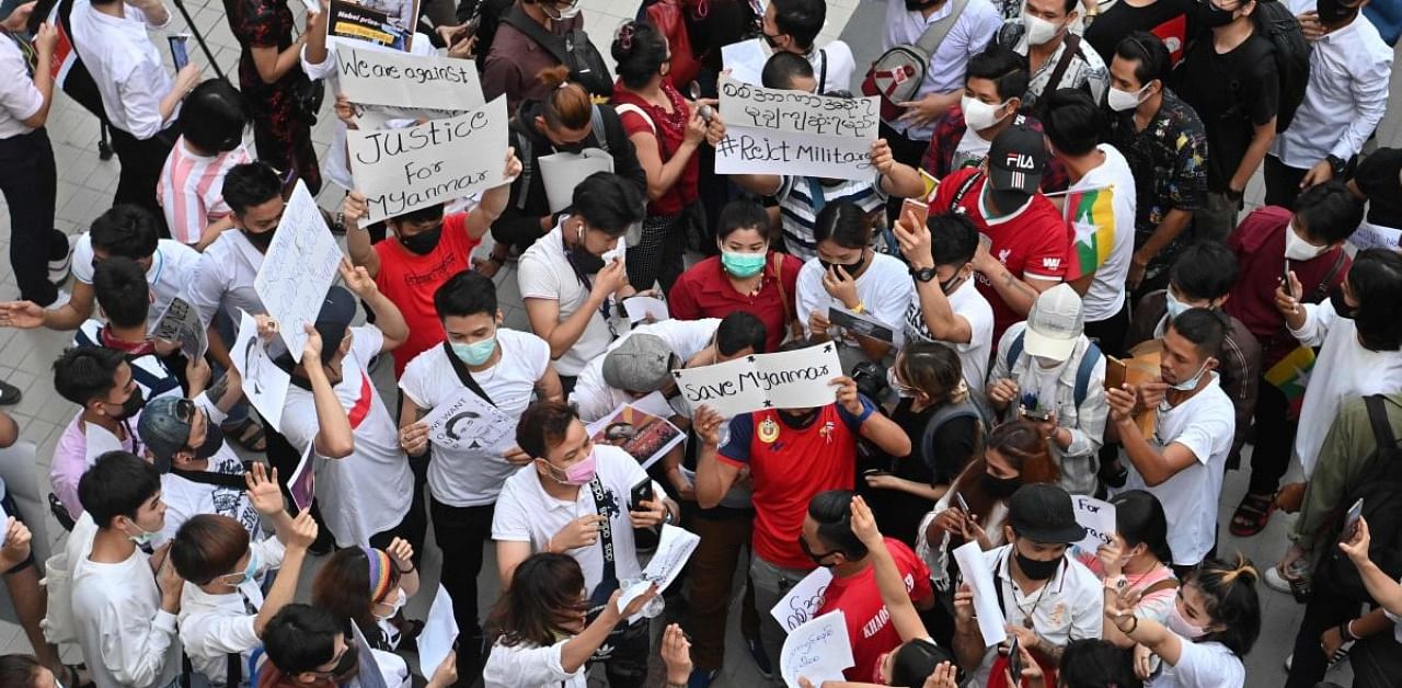 Protesters take part in a rally demanding the preservation of democracy in Thailand and neighbouring Myanmar, in Bangkok on February 10, 2021. Credit: AFP Photo