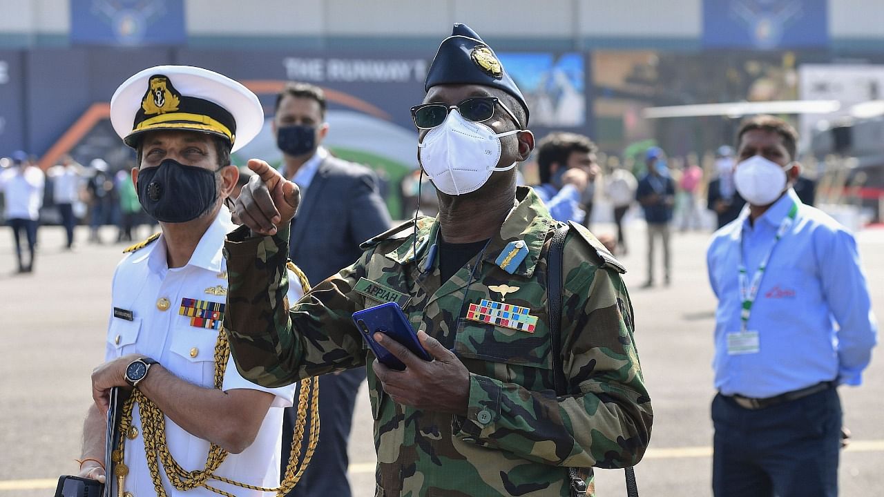 Visitors of international armed forces visit the Aero India 2021 airshow at the Yelahanka Air Force station, in Bangalore on February 4, 2021. Credit: AFP Photo