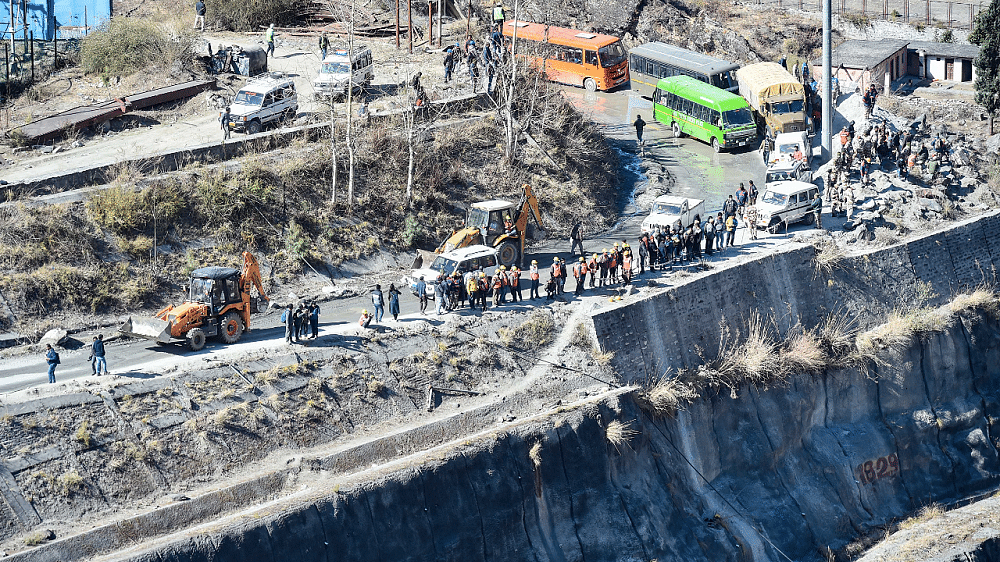 Search and rescue operation near the Raini village halted due to surge in water levels of Rishiganga river. Credit: PTI Photo