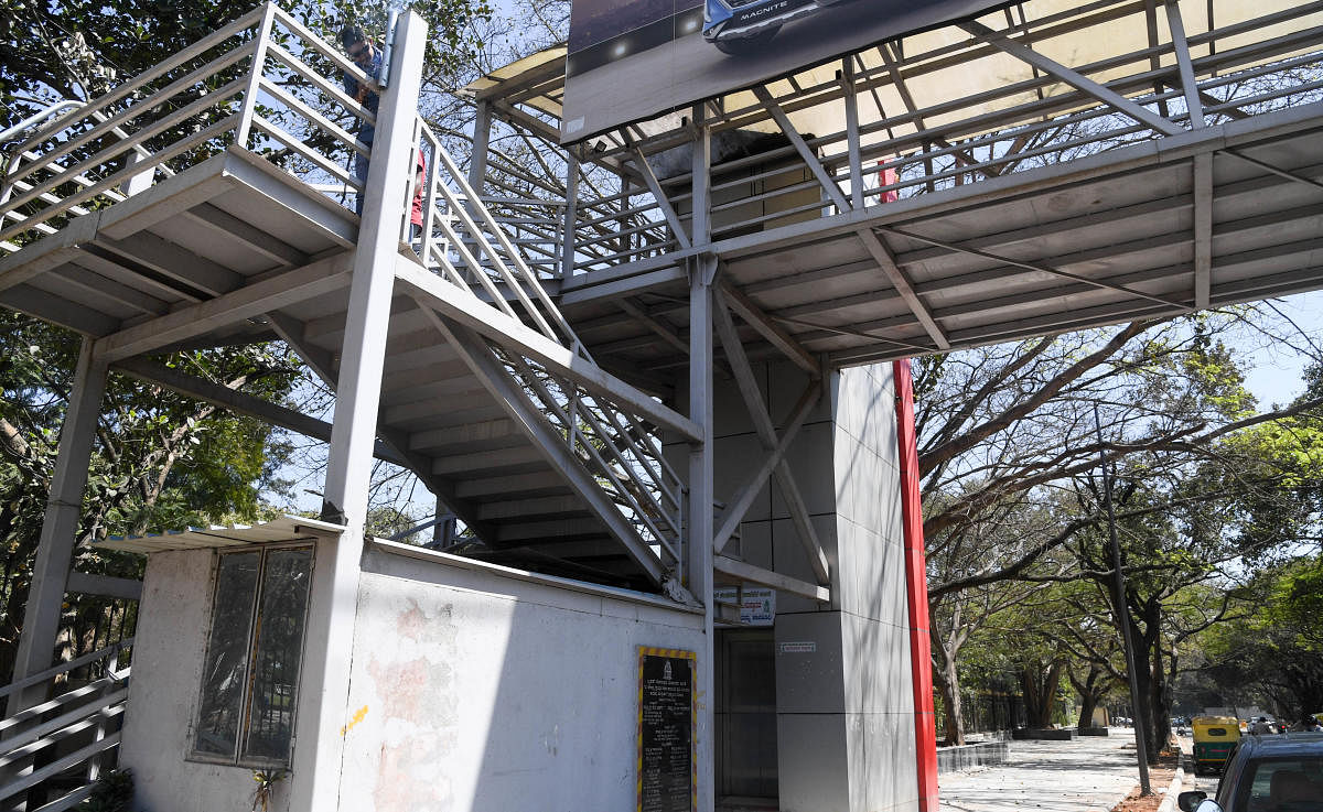 Skywalks have cropped up all along the Old Airport Road, where a Signal-Free Corridor is shaping up. DH PHOTOS / SHIVAKUMAR B H