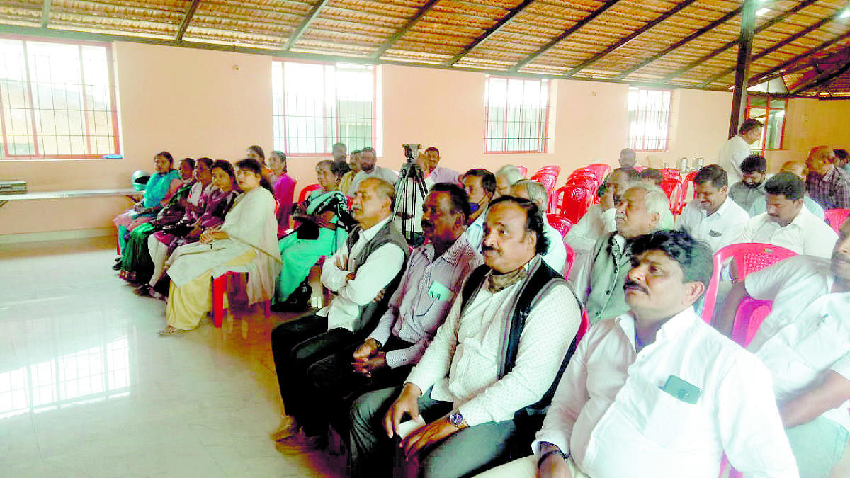 Members of various communities take part in a meeting of Ahinda Okkuta in Madikeri.