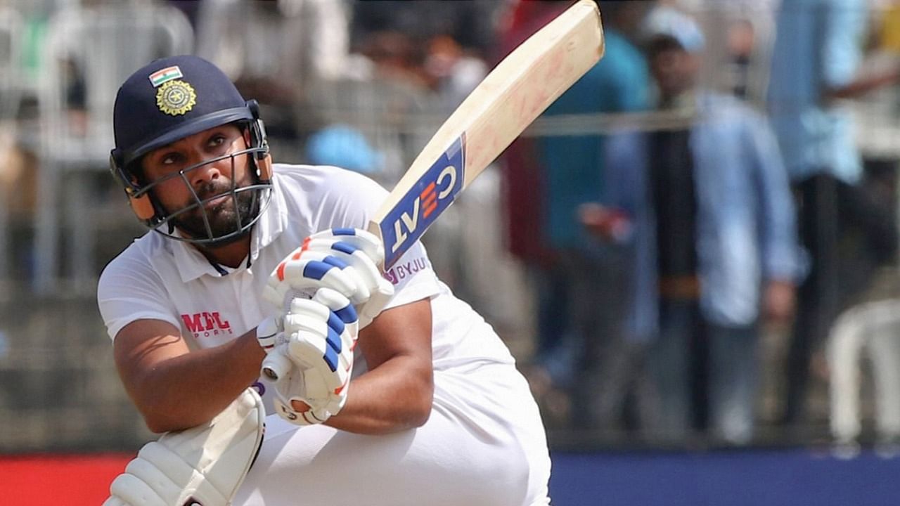 Sharma, welcomed with chants of "Rohit! Rohit!", hit 161 and put on a key fourth-wicket partnership of 162 with Ajinkya Rahane. Credit: PTI Photo.