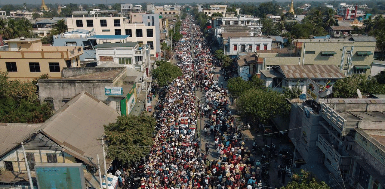 This aerial photo shows protesters marching on a road during a demonstration against the military coup in Shwebo in Myanmar's Sagaing Region. Credit: AFP Photo