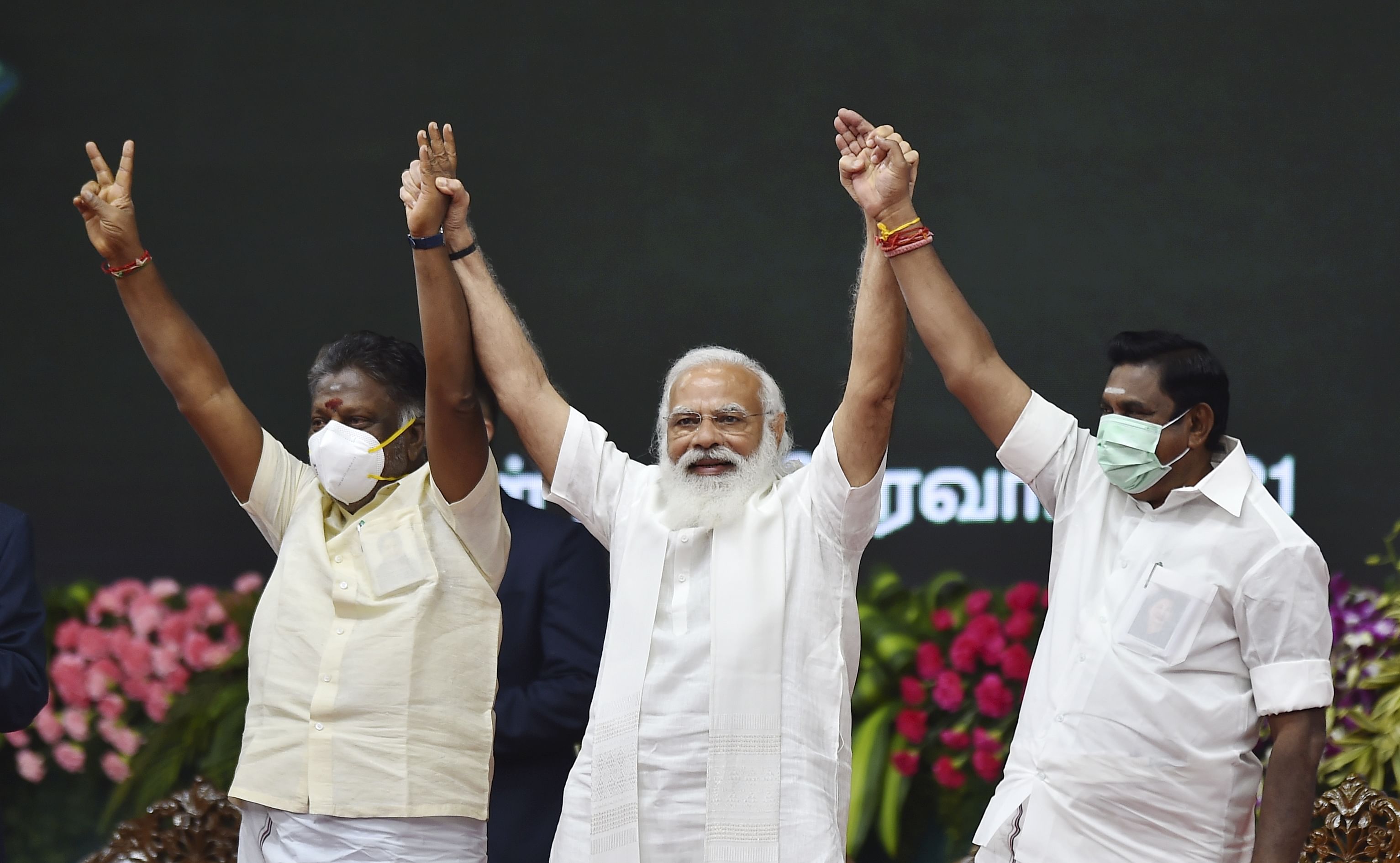 Prime Minister Narendra Modi with Tamil Nadu CM Edappadi K. Palaniswami and Dy. CM O Panneerselvam during the inauguration of Chennai Metro Rail Phase-I extension, that will link North Chennai with the Airport and Central Railway Station, in Chennai, Sunday, Feb. 14, 2021. Credit: PTI Photo