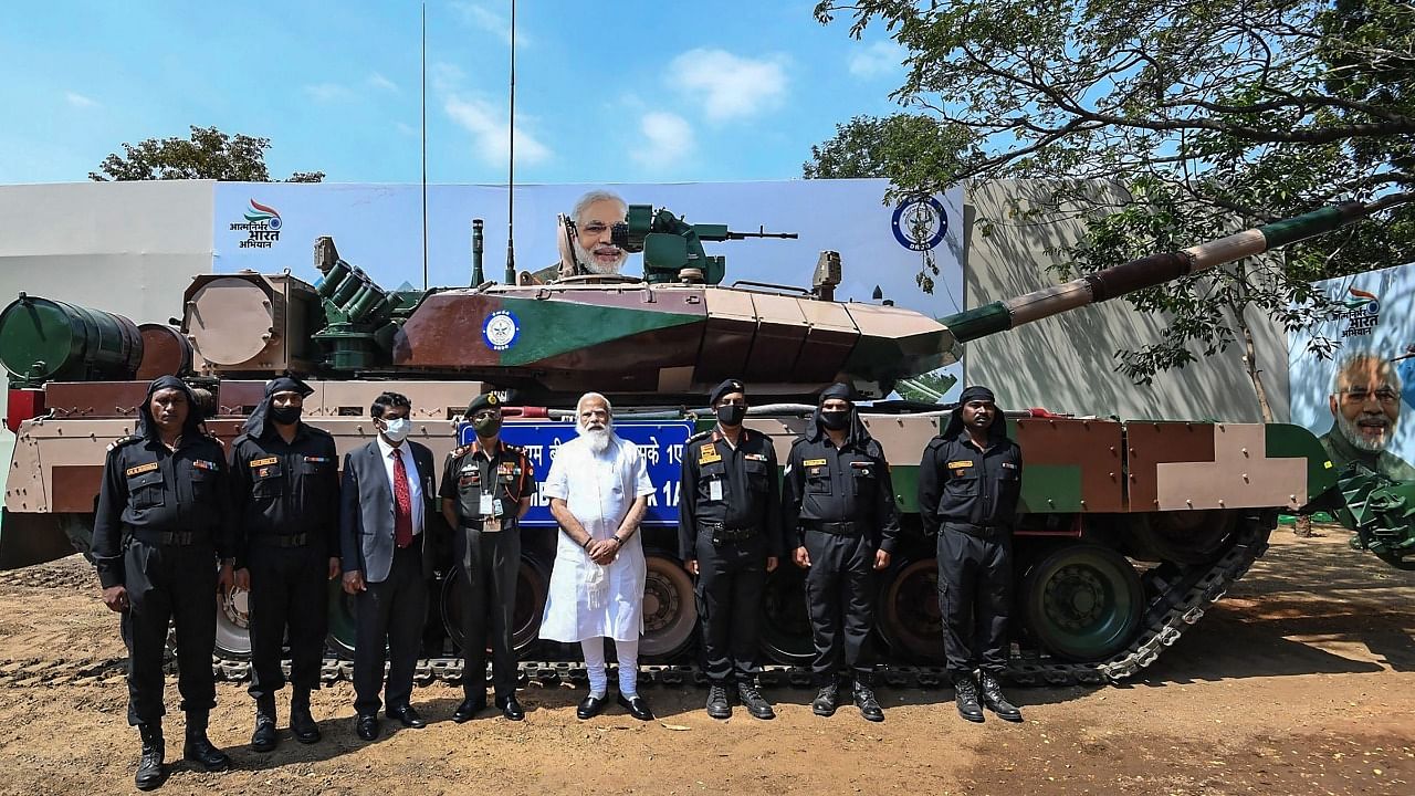 Prime Minister Narendra Modi seen handing over the indigenously developed Arjun Main Battle Tank (Mark 1A) tanks to the army, in Chennai. Credit: PTI Photo.