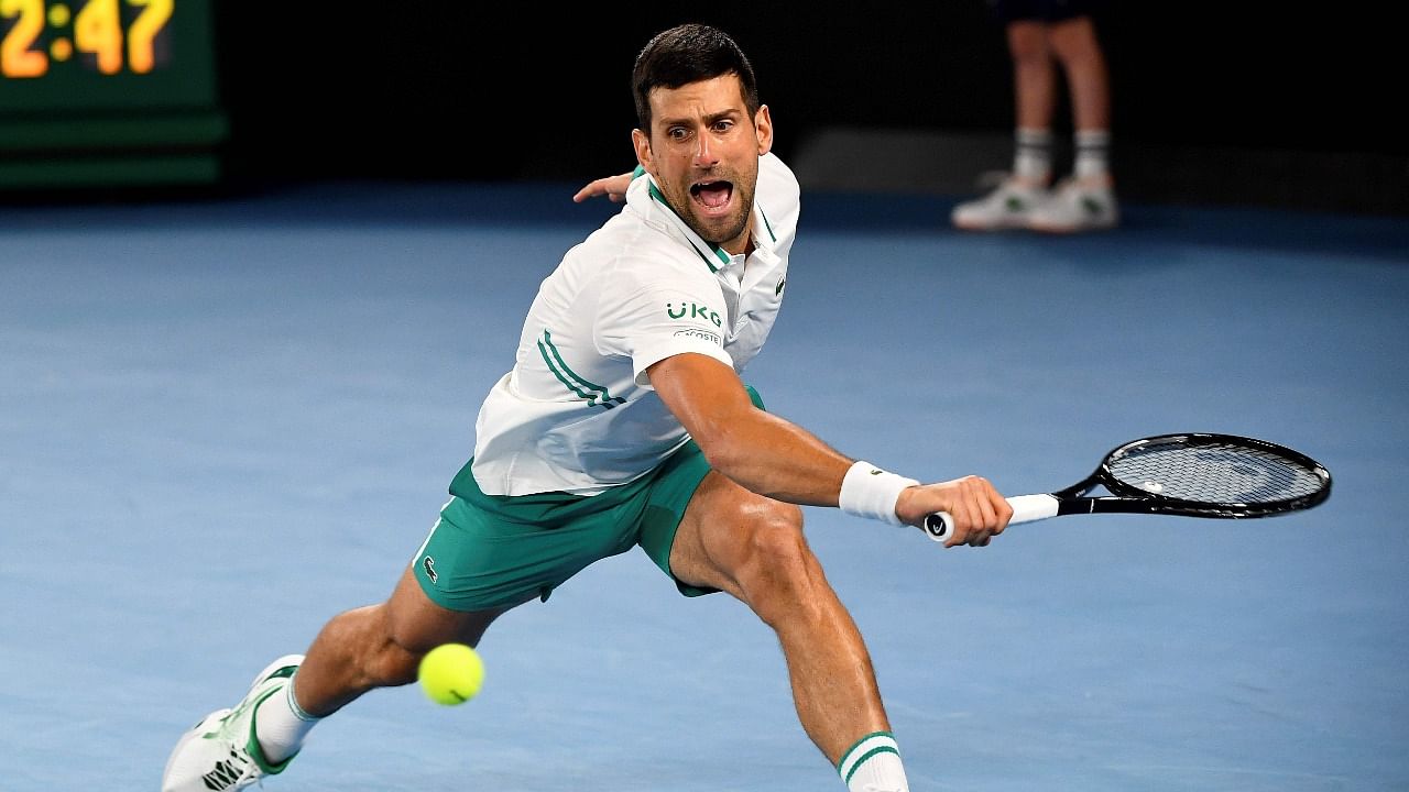 Djokovic's win against Raonic was his 300th at a Slam, only the second player in history to reach the mark after Roger Federer, who has 362.AFP File Photo