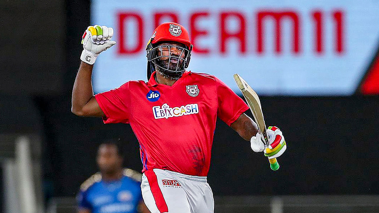 Kings XI Punjab's Chris Gayle celebrates after winning a match in the 13th edition of the IPL. Credit: PTI Photo