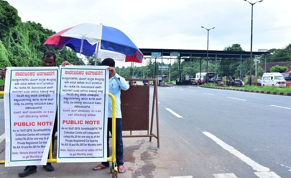 A public notice for the vehicle being charged for KA19 from July 16 at Suratkal Toll Gate in Mangalore. Credit: DH Photo