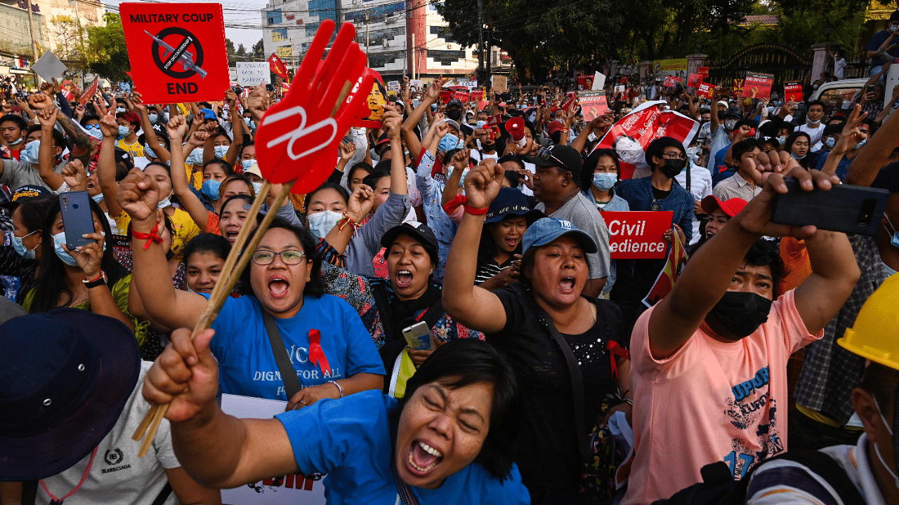 Protesters take part in a demonstration against the military coup in front of the National League for Democracy (NLD) office in Yangon. Credit: AFP Photo