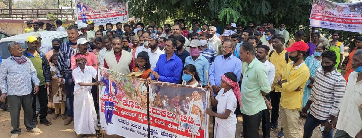 Members of Yarava community take out a rally in Ponnampet, urging the governmentto fulfil the demands of the community.