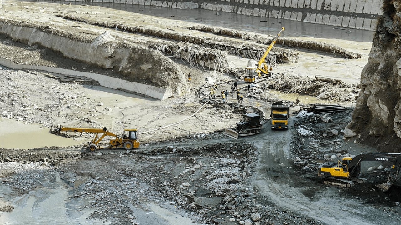 Rescue and restoration work continues at damaged Tapovan barrage, weeks after the glacier burst at Joshimath which triggered a massive flash flood on Feb. 7, in Chamoli district of Uttarakhand, Wednesday, Feb. 17, 2021. Credit: PTI Photo