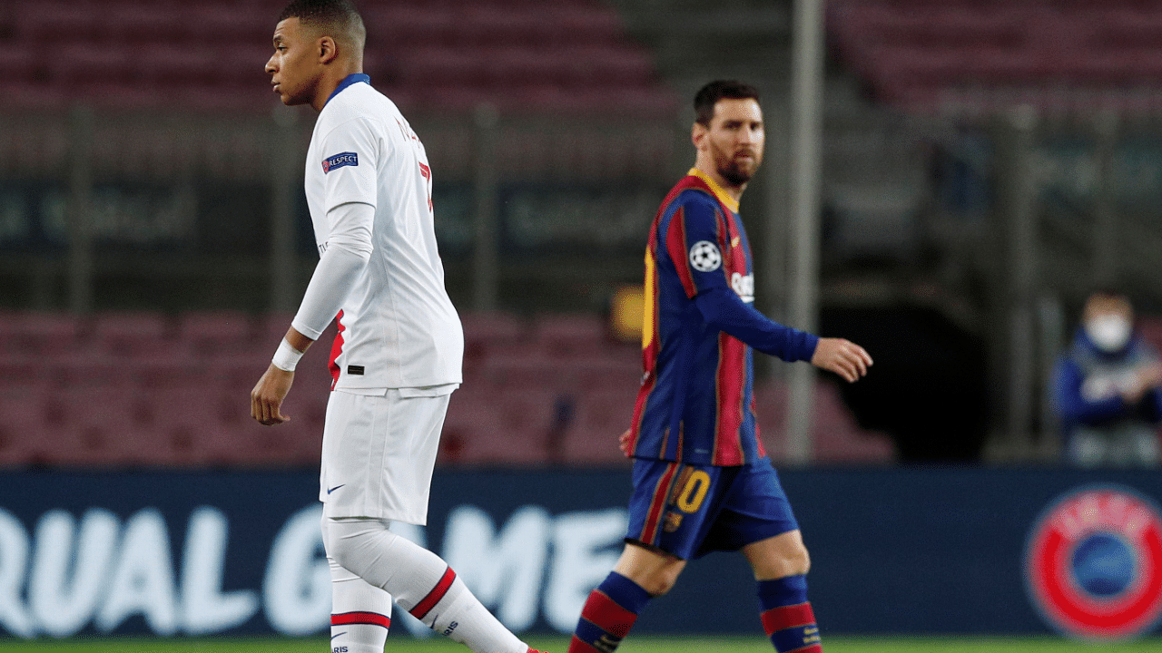 Barcelona's Lionel Messi and Paris St Germain's Kylian Mbappe on the pitch before. Credit: Reuters Photo