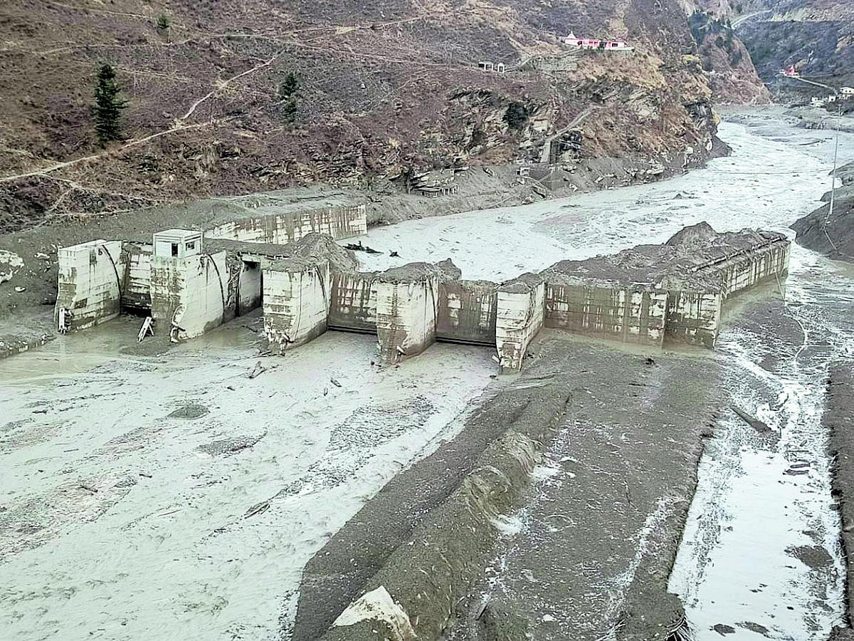 Damaged Dhauliganga hydropower project after a glacier broke off in Joshimath causing a massive flood in the Dhauli Ganga river, in Chamoli district of Uttarakhand, Sunday, Feb. 7, 2021. Credit: PTI Photo