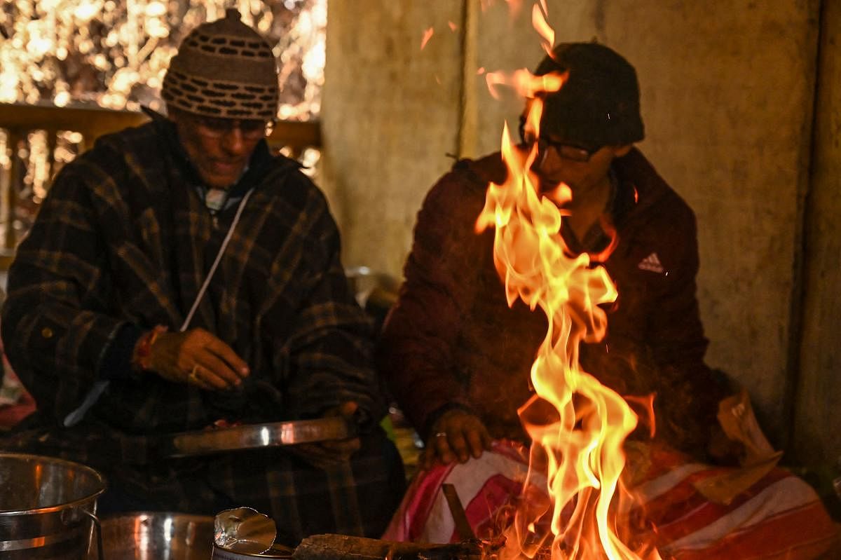 Devotees pray inside the Sheetal Nath temple, which was reopened after more than three decades, in Srinagar. Credit: AFP photo. 