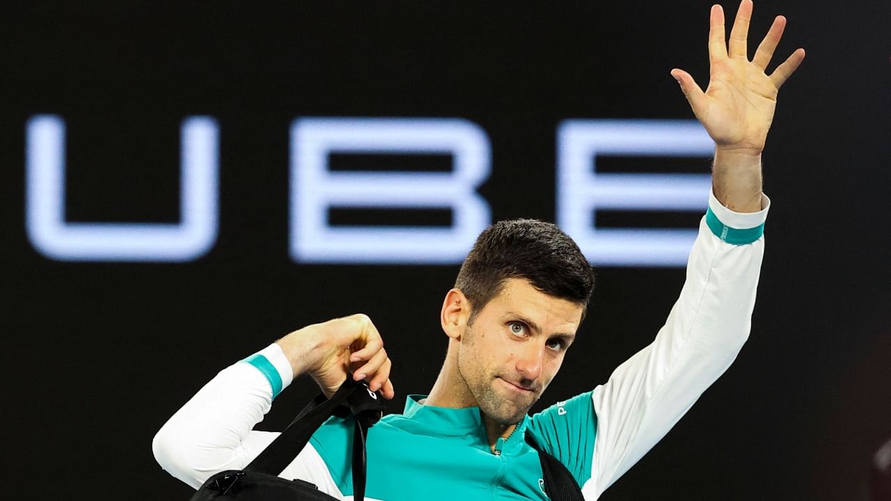 Serbia's Novak Djokovic leaves the court after winning against Russia's Aslan Karatsev at the end of their men's singles semi-final match on day eleven of the Australian Open tennis tournament in Melbourne on February 18, 2021. Credit: AFP Photo
