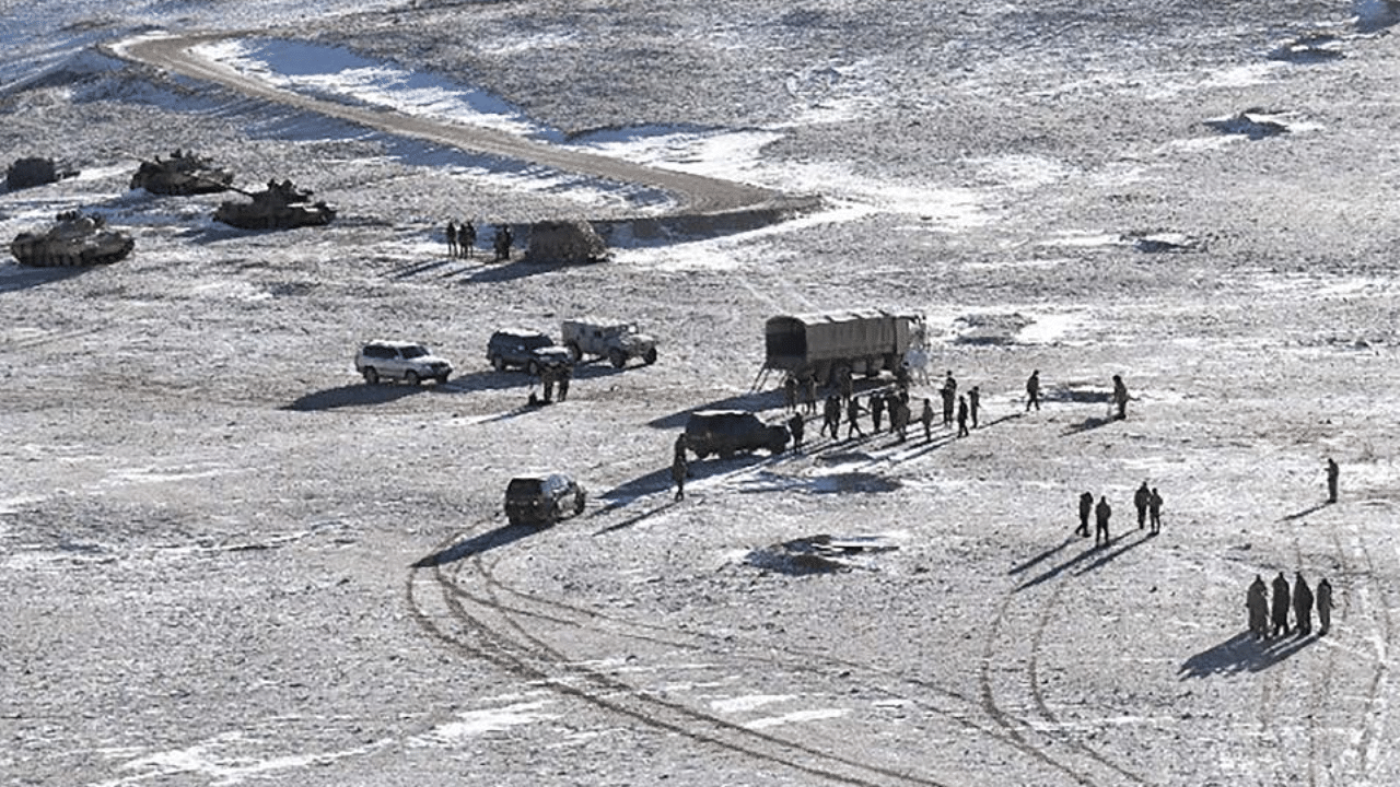 n this undated handout photograph released by the Indian Army on February 16, 2021 shows People Liberation Army (PLA) soldiers and tanks during military disengagement along the Line of Actual Control (LAC) at the India-China border in Ladakh. Credit: AFP 