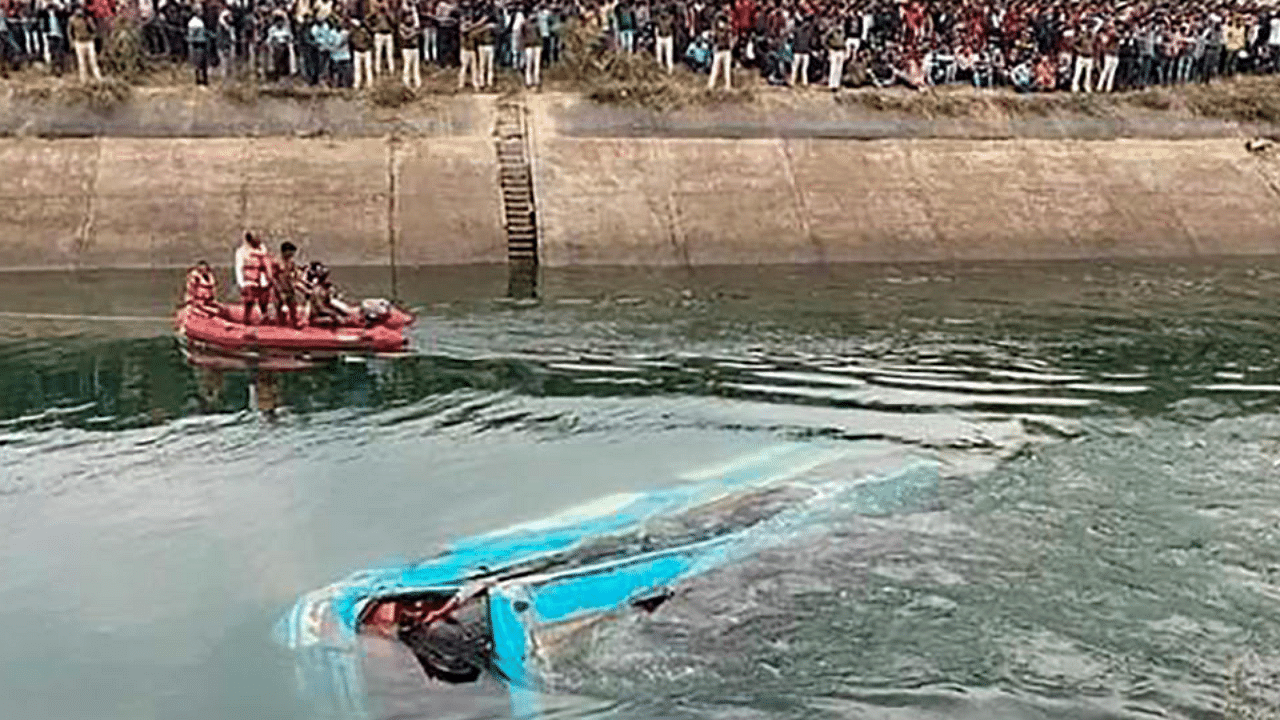  NDRF team carries out a rescue operation after an overcrowded bus plunged into a canal in Sidhi district of Madhya Pradesh, Tuesday, Feb. 16, 2021. Credit: PTI Photo