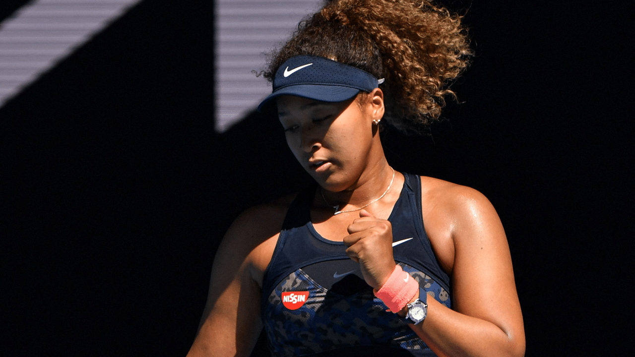 Japan's Naomi Osaka celebrates beating Serena Williams of the US in their women's singles semi-final match. Credit: AFP Photo