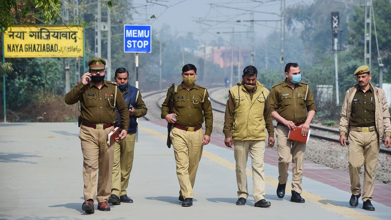 Police personnel patrol at New Ghaziabad railway station during a four-hour 'rail roko' demonstration across the country, called by Samyukta Kisan Morcha (SKM). Credit: PTI Photo