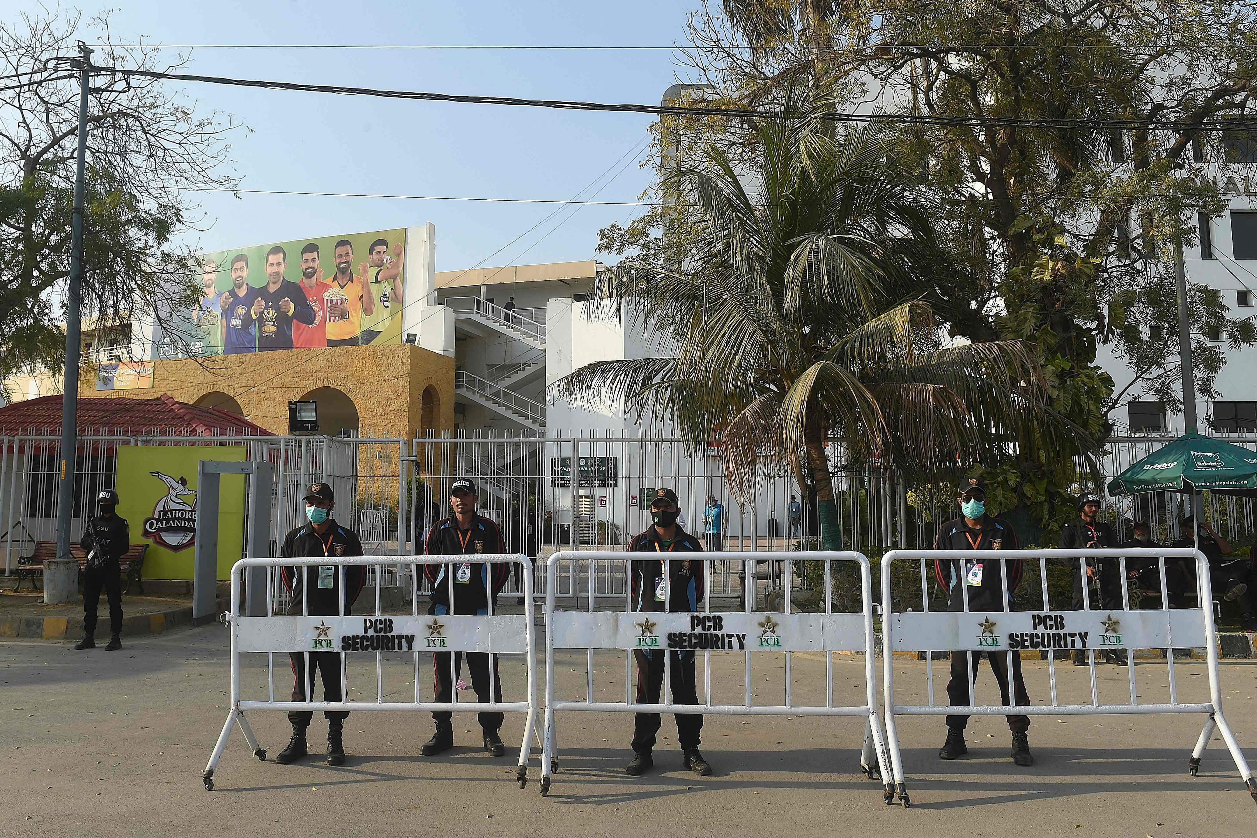 Policemen stand guard outside the National Cricket Stadium in Karachi. Credit: AFP Photo