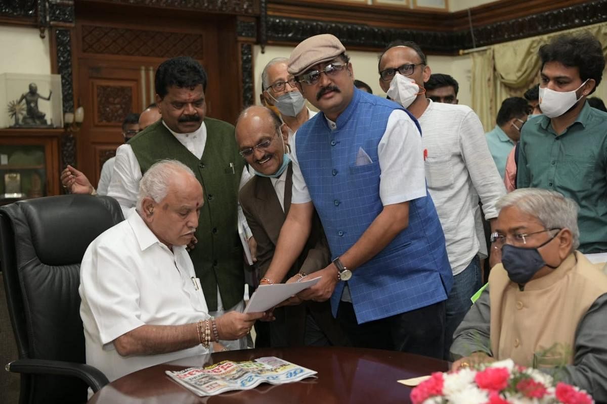A delegation, led by Bengaluru Kodava Samaja, submits a memorandum to Chief Minister B S Yediyurappa on Friday.