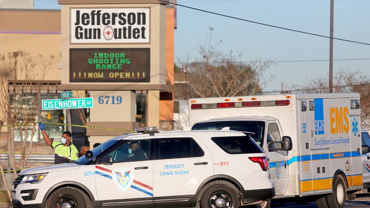 A crime scene technician with the Jefferson Parish Sheriffs Office at Jefferson Gun Outlet in Metairie, Louisiana. Credit: AFP Photo